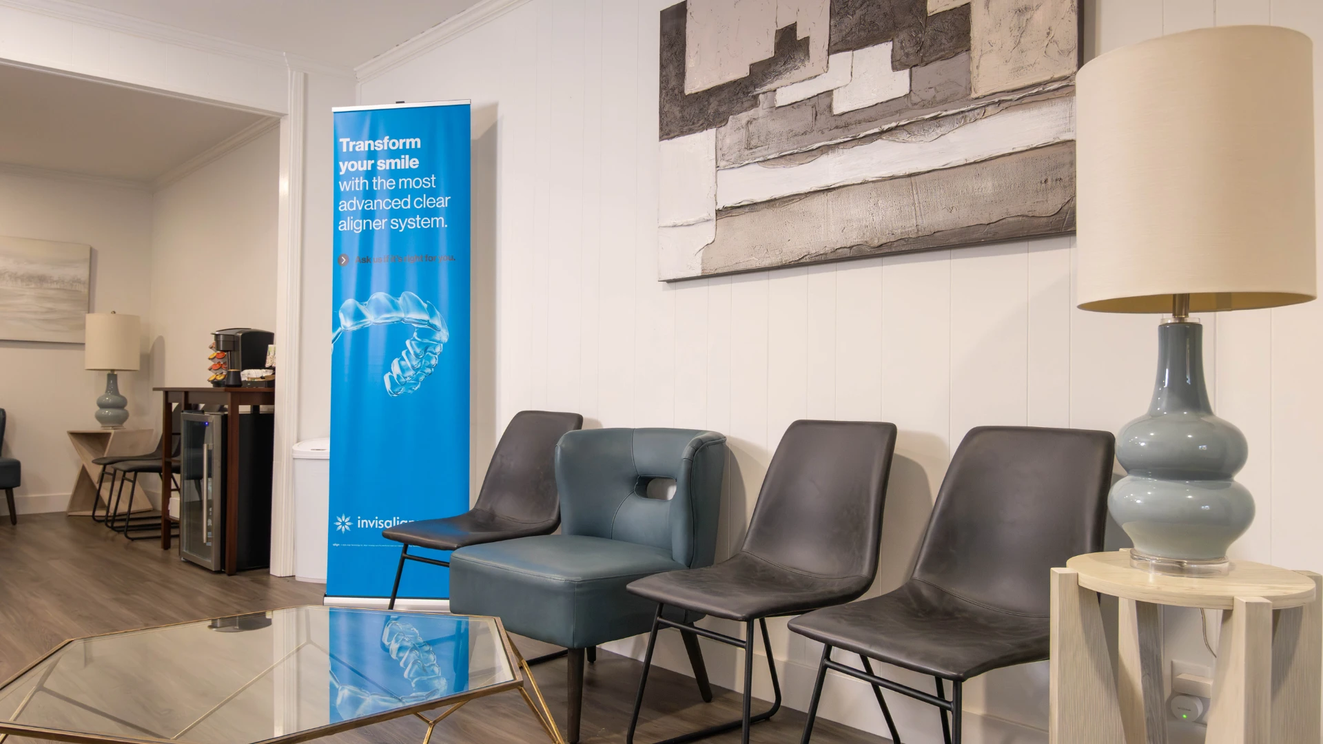 The Prairie Creek Dental waiting room with an Invisalign display