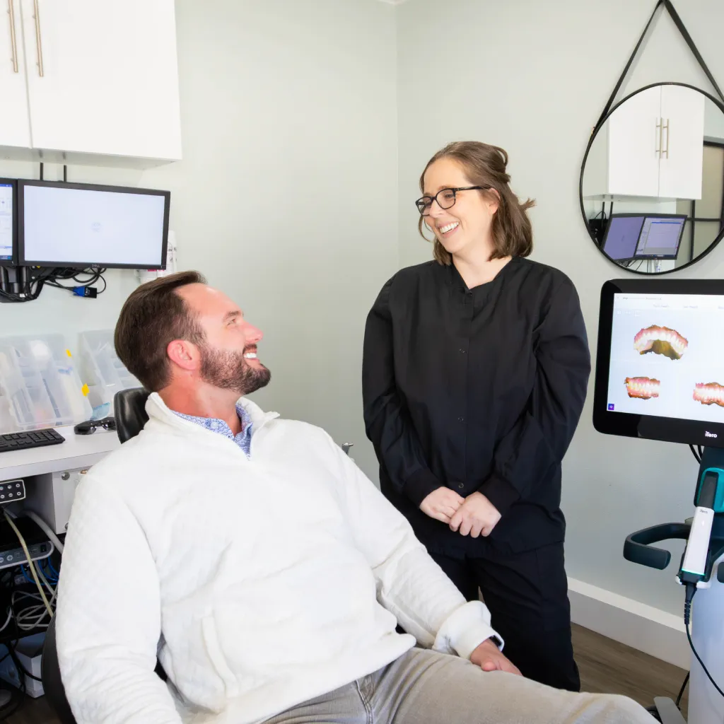 a man and woman holding each other