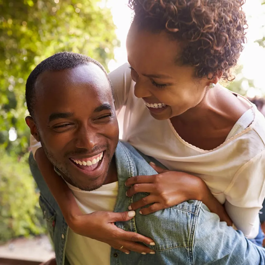 a person holding a child