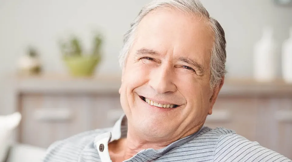 a man smiling for the camera