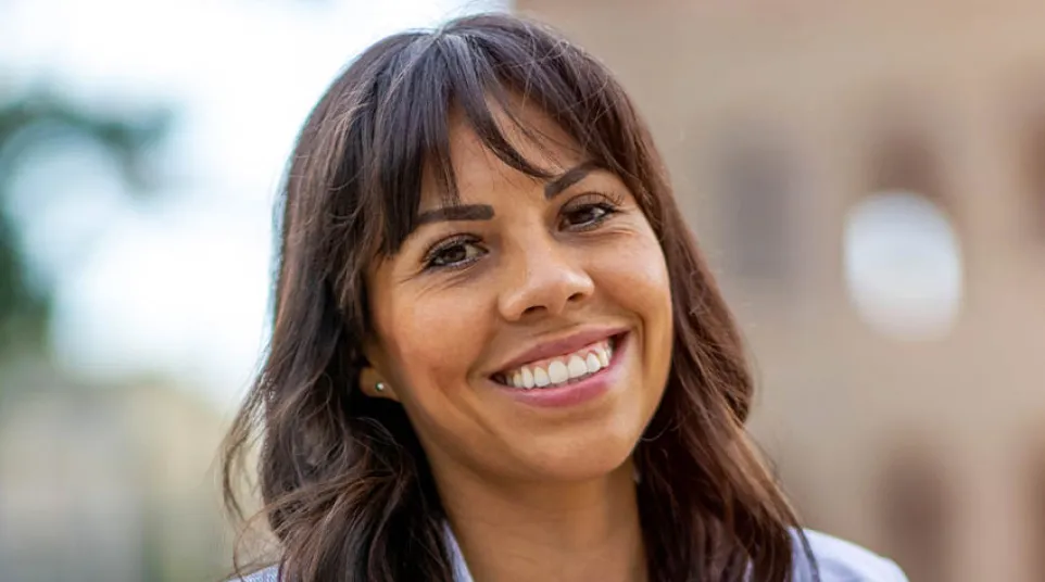 a woman smiling at the camera