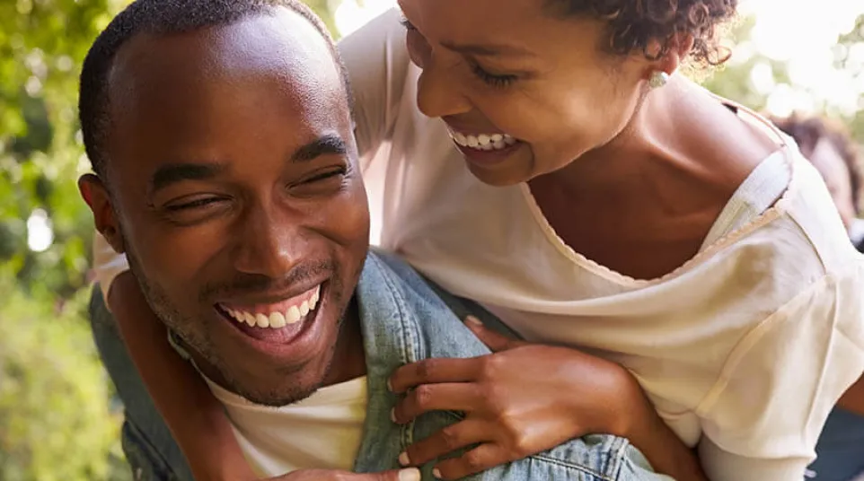 a person holding a child