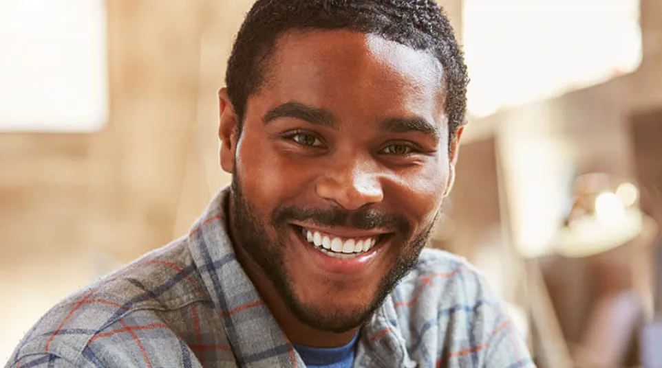 Clyde Gates smiling for the camera